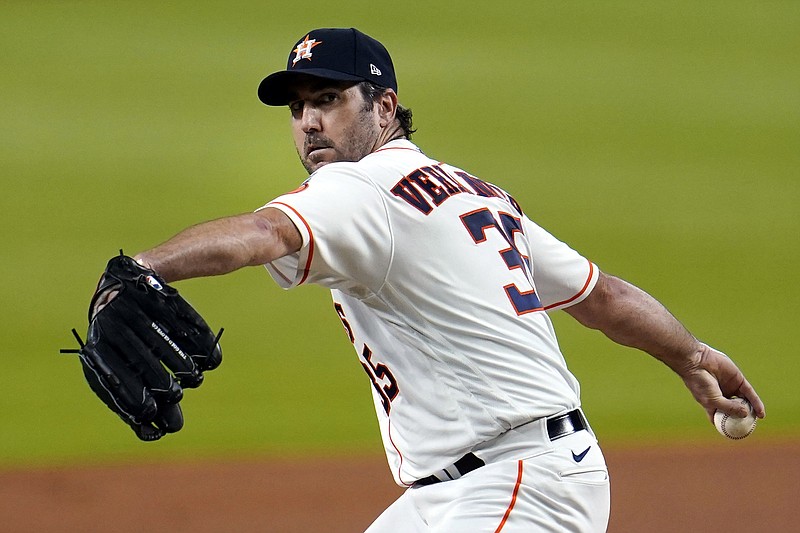 Houston Astros starting pitcher Justin Verlander throws against the Seattle Mariners during the first inning of July 24 game in Houston. The Astros announced Saturday that Verlander needs Tommy John surgery and could miss the entire 2021 season. - Photo by David J. Phillip of The Associated Press