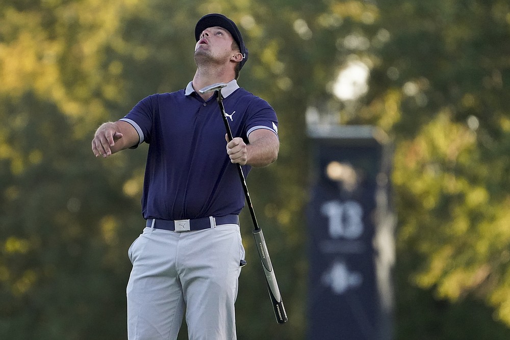 Bryson DeChambeau, of the United States, reacts after sinking a putt for birdie on the 16th green during the third round of the US Open Golf Championship, Saturday, Sept. 19, 2020, in Mamaroneck, N.Y. (AP Photo/John Minchillo)