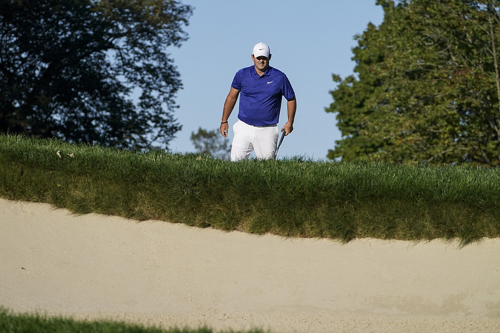 Patrick Reed, of the United States, walks on the 11th hole during the third round of the US Open Golf Championship, Saturday, Sept. 19, 2020, in Mamaroneck, N.Y. (AP Photo/John Minchillo)