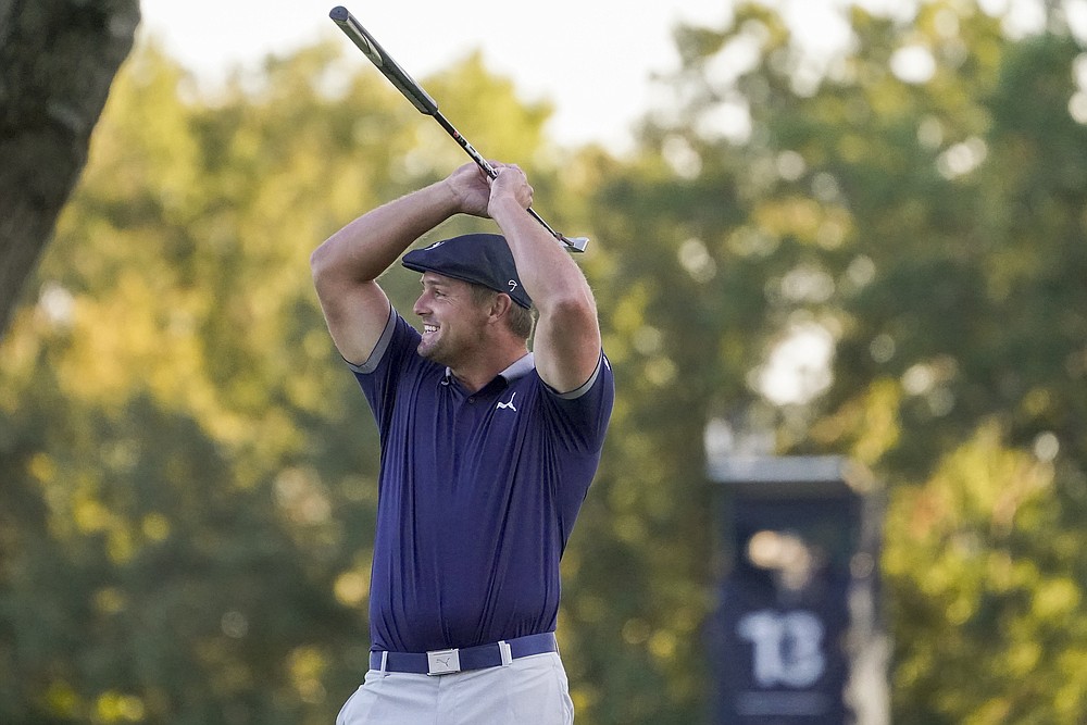 Bryson DeChambeau, of the United States, reacts after sinking a putt on the 16th green for birdie during the third round of the US Open Golf Championship, Saturday, Sept. 19, 2020, in Mamaroneck, N.Y. (AP Photo/John Minchillo)