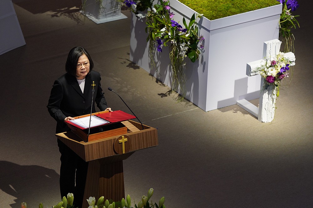 Taiwan President Tsai Ing-wen attends a memorial service for the late former Taiwanese President Lee Teng-hui in Taipei, Taiwan on Saturday, Sept. 19, 2020. Lee, remembered for leading the island's transition to democracy, died at age 97 in July, (Pool Photo via AP)