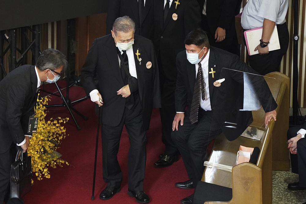 U.S. Undersecretary of State Keith Krach, at right rise as former Japanese Prime Minister Yoshiro Mori center arrives at a memorial service for the late former Taiwanese President Lee Teng-hui in Taipei, Taiwan on Saturday, Sept. 19, 2020. Lee, remembered for leading the island's transition to democracy, died at age 97 in July, (Pool Photo via AP Photo)