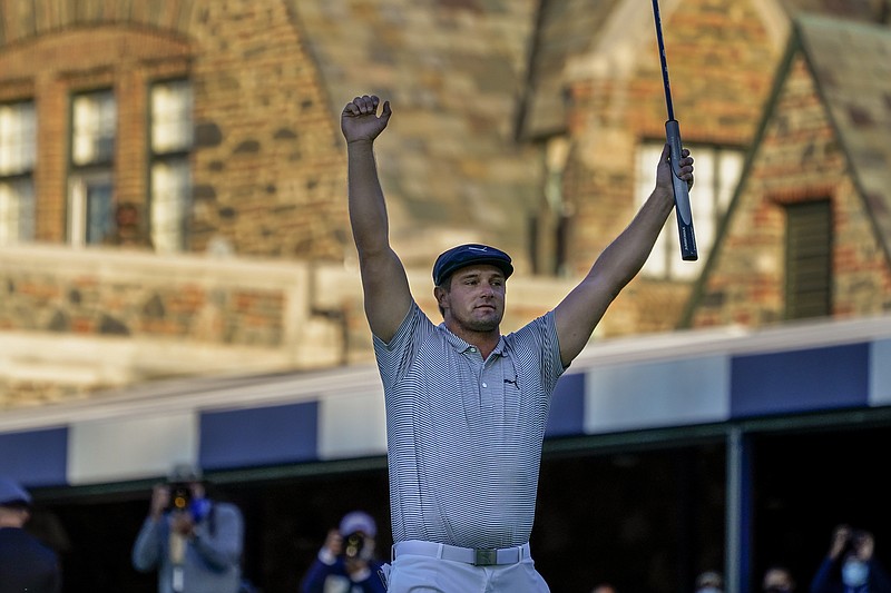 Bryson DeChambeau, of the United States, reacts after sinking a putt for par on the 18th hole to win the US Open Golf Championship, Sunday, Sept. 20, 2020, in Mamaroneck, N.Y. (AP Photo/Charles Krupa) story.lead_photo.caption