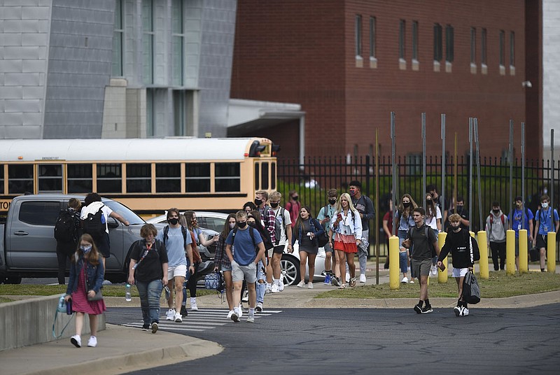 Students end the school day Aug. 24 at Bentonville High School. Go to nwaonline.com/200921Daily/ for today's photo gallery. 
(NWA Democrat-Gazette/Charlie Kaijo)