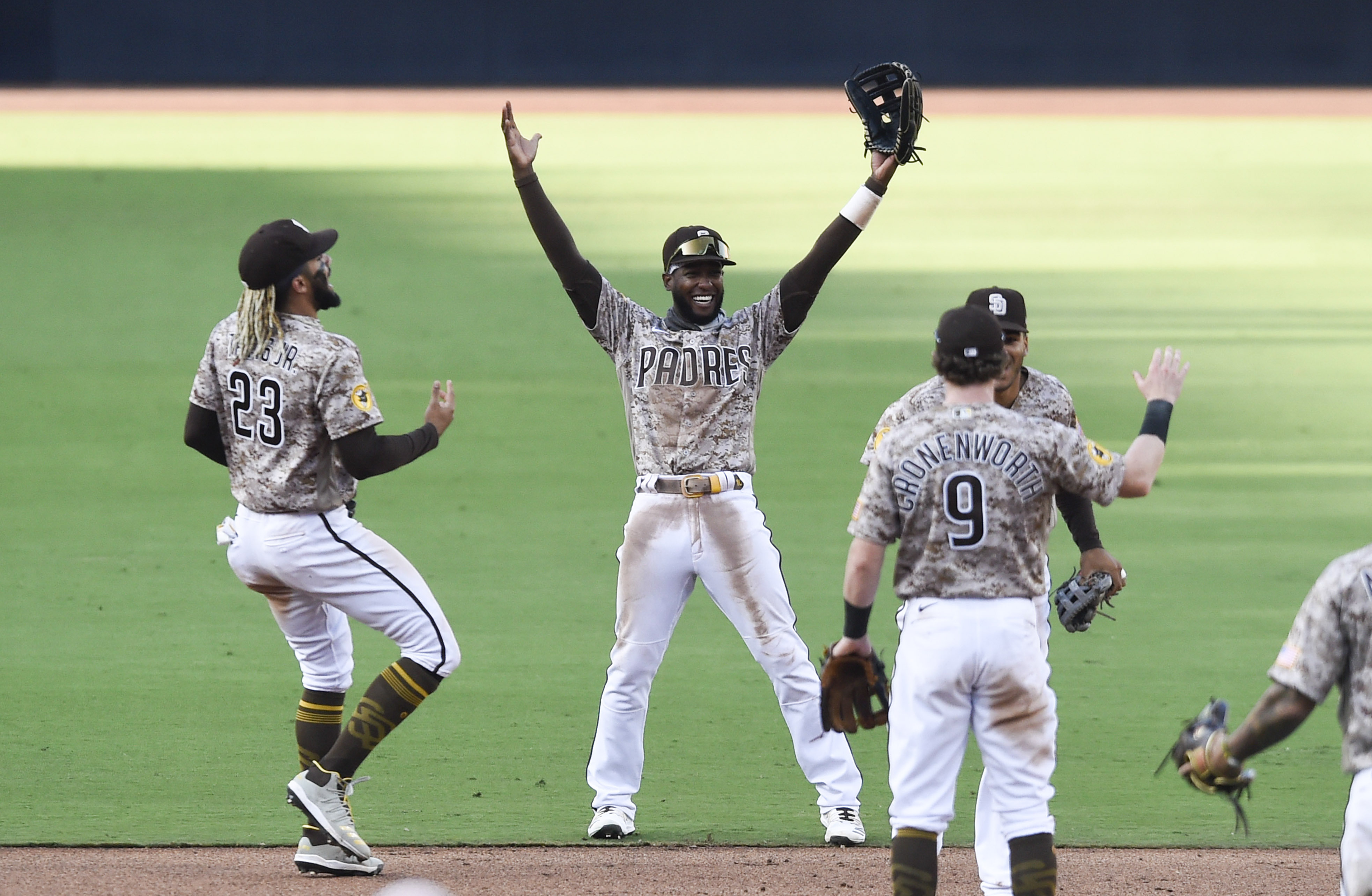 Postseason's first-ever walk-off slam lifts Rangers over Tigers, 7-3.