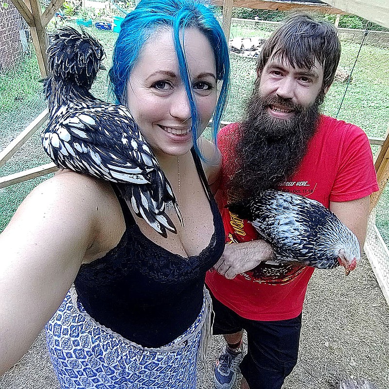 COURTESY PHOTO/Nicole Ridlen and Brandon VanDalsem and a portion of their feathered friends, Moly and Goldie.