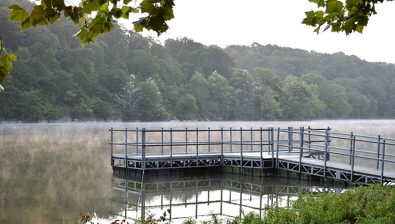 Westside Eagle Observer/MIKE ECKELS
An early morning fog rolls across Crystal Lake near Decatur Sept. 17 as temperatures dipped into the lower sixties, a sign that fall will soon be upon Northwest Arkansas.