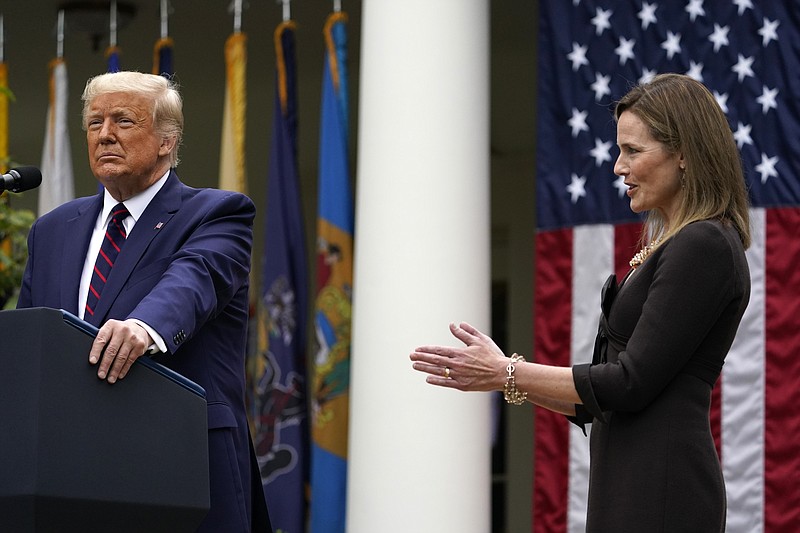 Judge Amy Coney Barrett applauds as President Donald Trump announces Barrett as his nominee to the Supreme Court, in the Rose Garden at the White House, Saturday, in Washington. - AP Photo/Alex Brandon