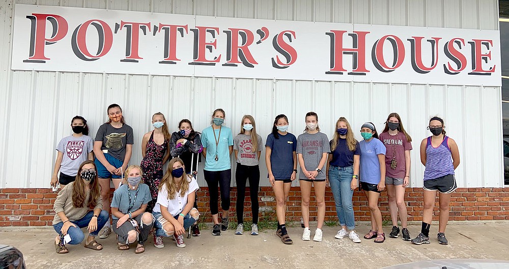 Cross country program volunteers at Potter's House