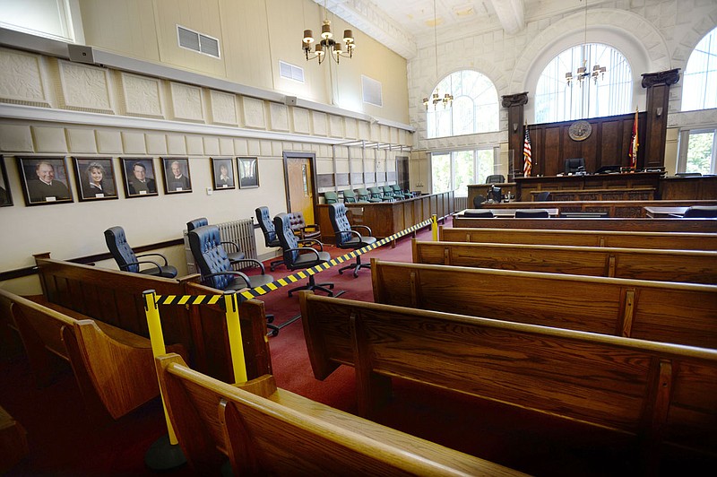 The traditional jury box has been expanded Thursday, Sept. 24, 2020, so jurors can spread out as court staff prepares for jury trials while still providing for safety in the current pandemic in the Benton County Courthouse on the square in Bentonville. Visit nwaonline.com/200927Daily/ for today's photo gallery. 
(NWA Democrat-Gazette/Andy Shupe)