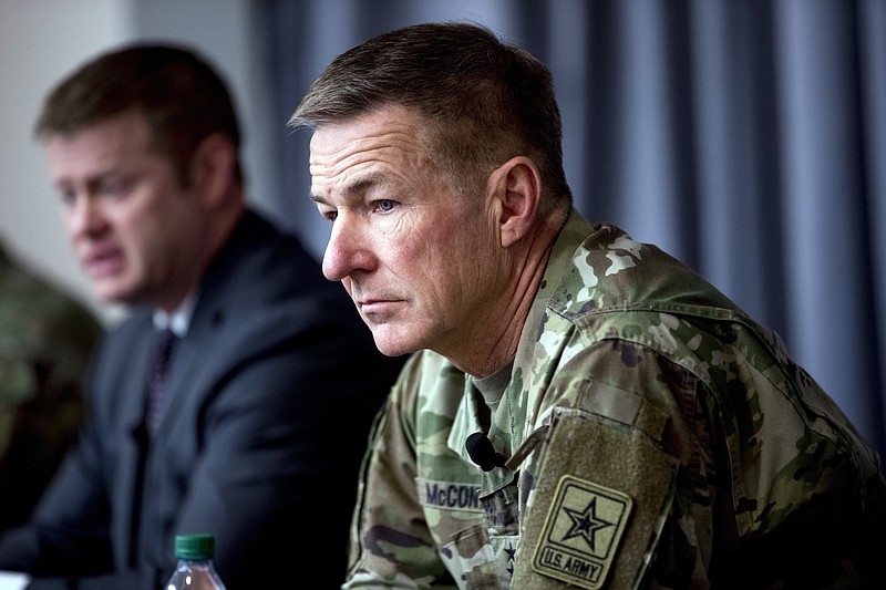 In this March 19 file photo, Secretary of the Army Ryan McCarthy, left, accompanied by Gen. James McConville, Army chief of staff, right, speaks at a news conference at U.S. Army Medical Research and Development Command at Fort Detrick in Frederick, Md. Military suicides have increased by as much as 20% this year compared to the same period last year, and some incidents of violent behavior have spiked, as service members struggle with isolation and other impacts of COVID-19 added to the pressures of war-zone deployments and responding to national disasters and civil unrest. McConville said there's new attention to giving service members "the time that they need to come back together and recover.” - AP Photo/Andrew Harnik