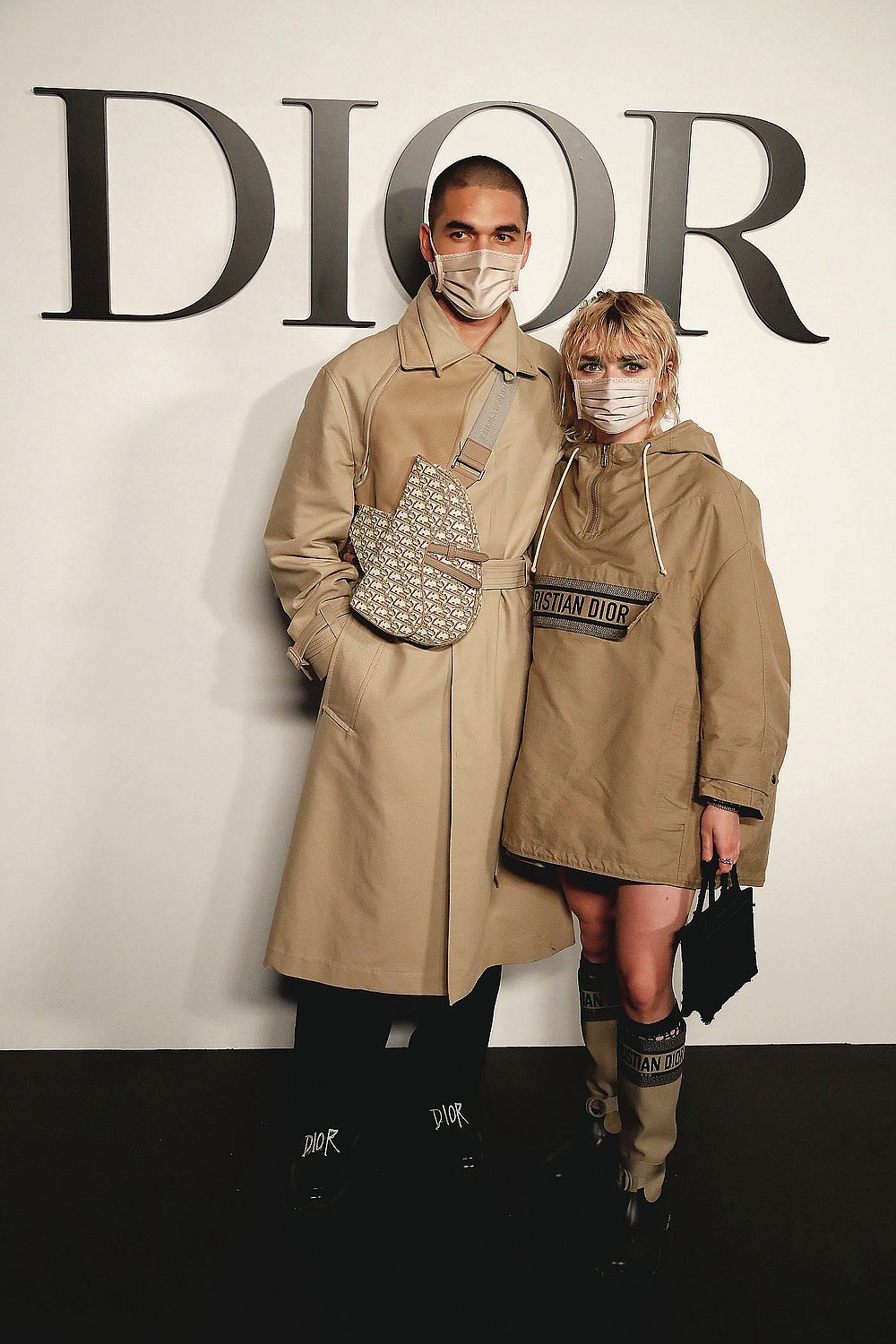 British actress Maisie Williams and Reuben Selby pose before Dior's Spring-Summer 2021 fashion collection Tuesday, Sept. 29, 2020 before the show during the Paris fashion week. (AP Photo/Francois Mori)