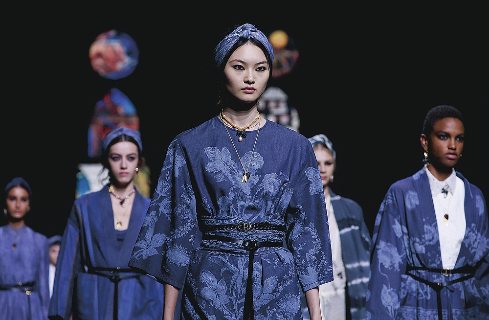 Models wear creations for Dior's Spring-Summer 2021 fashion collection, Tuesday, Sept. 29, 2020, during Paris fashion week. (Photo by Vianney Le Caer/Invision/AP)