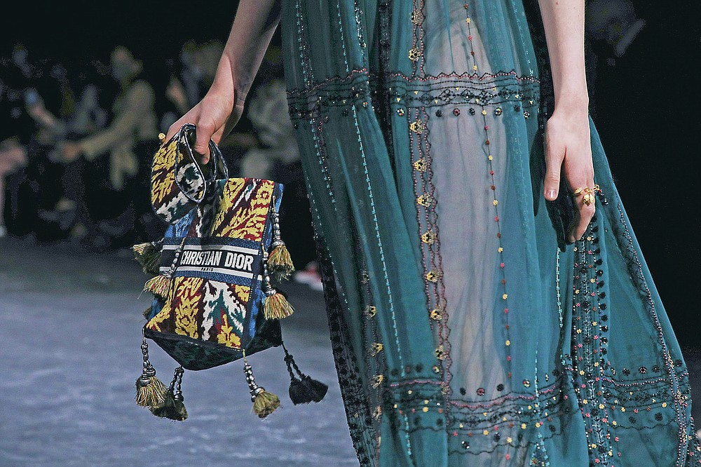 A model wears a creation for Dior's Spring-Summer 2021 fashion collection, Tuesday, Sept. 29, 2020, during Paris fashion week. (Photo by Vianney Le Caer/Invision/AP)