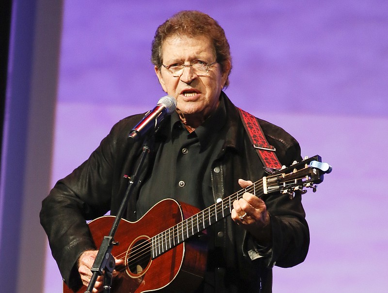 Musician Mac Davis performs at the Texas Film Awards in Austin, Texas on March 6, 2014. Davis, a country star and Elvis songwriter,  died on Tuesday, Sept. 29, 2020 after heart surgery. He was 78. 
 (Photo by Jack Plunkett/Invision/AP, File)