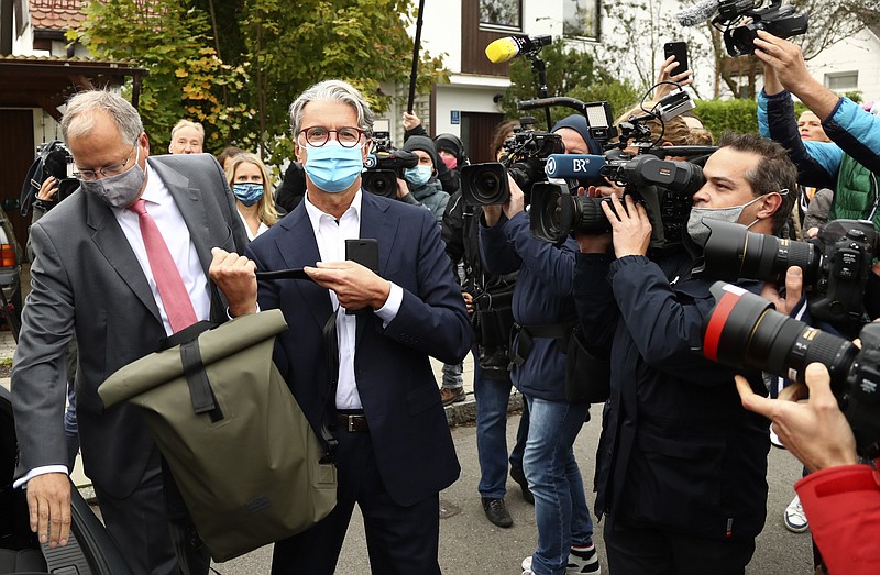 Rupert Stadler, former CEO of German car manufacturer Audi, arrives at a district court in Munich, Germany, Wednesday, Sept. 30, 2020. Stadler stands trial in Germany over the "dieselgate" emissions scandal, five years after parent company VW admitted responsibility. (AP Photo/Matthias Schrader)