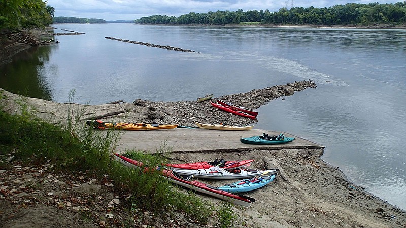 Boats are beached at a Missouri River access during a lunch stop in Portland, Mo. Paddlers explored about 65 miles of the big river from Bonnonts Mill, Mo., near Jefferson City, Mo., to Washington, Mo., just west of St. Louis.
(NWA Democrat-Gazette/Flip Putthoff)