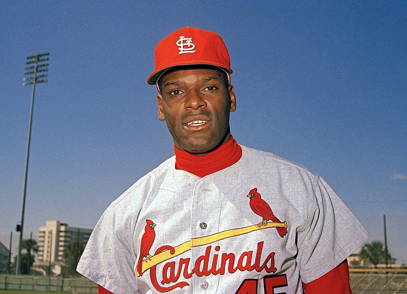 FILE - In this March 1968 file photo, St. Louis Cardinals pitcher Bob Gibson is pictured during baseball spring training in Florida. Gibson, the dominating pitcher who won a record seven consecutive World Series starts and set a modern standard for excellence when he finished the 1968 season with a 1.12 ERA, died Friday, Oct. 2, 2020. He was 84. (AP Photo, File)