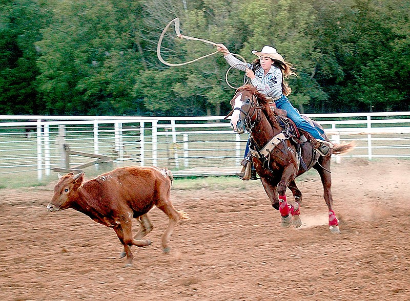 Janelle Jessen/Herald-Leader

Halle Cummings practices breakaway roping at the Oak Grove Arena in Highfill last week with her horse Nelly. Cummings has earned top rankings in several events from the National Little Britches Rodeo Association.