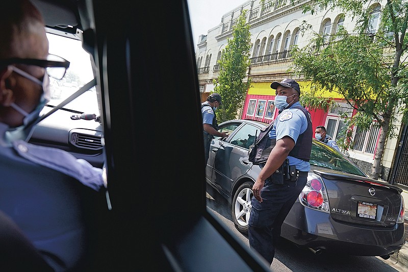 One Chicago community endures virus violence and turmoil