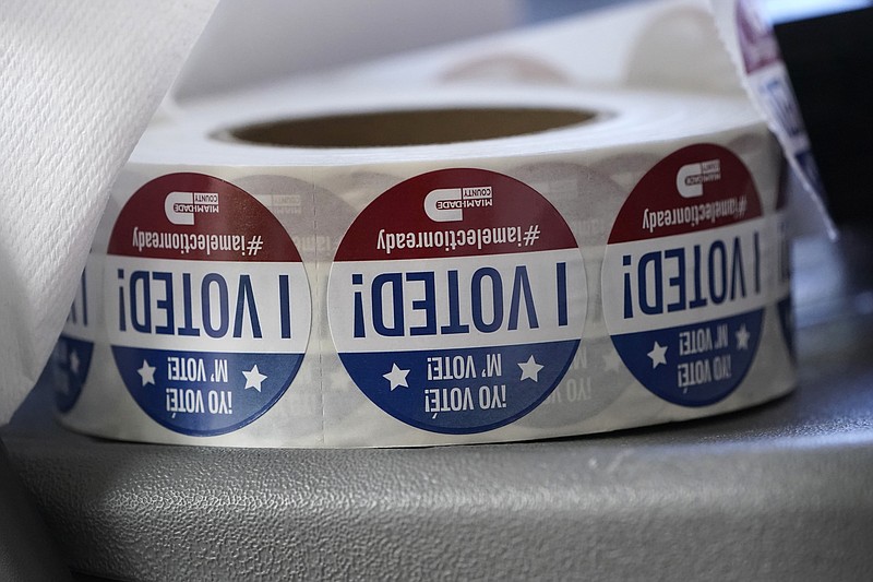 A roll of "I Voted!" stickers are shown, Tuesday, Oct. 6, 2020, at the Miami-Dade County Elections Department in Doral, Fla. Florida Gov. Ron DeSantis extended the state's voter registration deadline after heavy traffic crashed the state's online system and potentially prevented thousands of enrolling to cast ballots in next month's presidential election. (AP Photo/Wilfredo Lee)