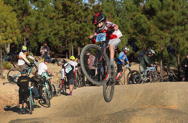 A rider participates in the 2019 Gudrun Mountain Bike Festival “Jump Jam.” - Photo by Jami Smith of The Sentinel-Record