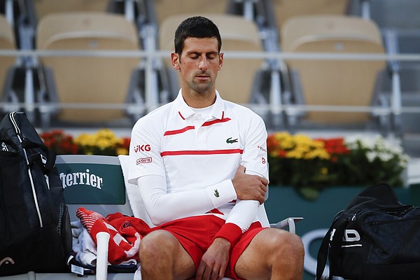 Djokovic's body acts up at French Open; faces Tsitsipas next