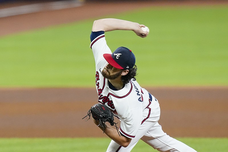 Atlanta Braves' Ian Anderson delivers a pitch during the fourth inning in Game 2 of a baseball National League Division Series against the Miami Marlins Wednesday, Oct. 7, 2020, in Houston. (AP Photo/Eric Gay)