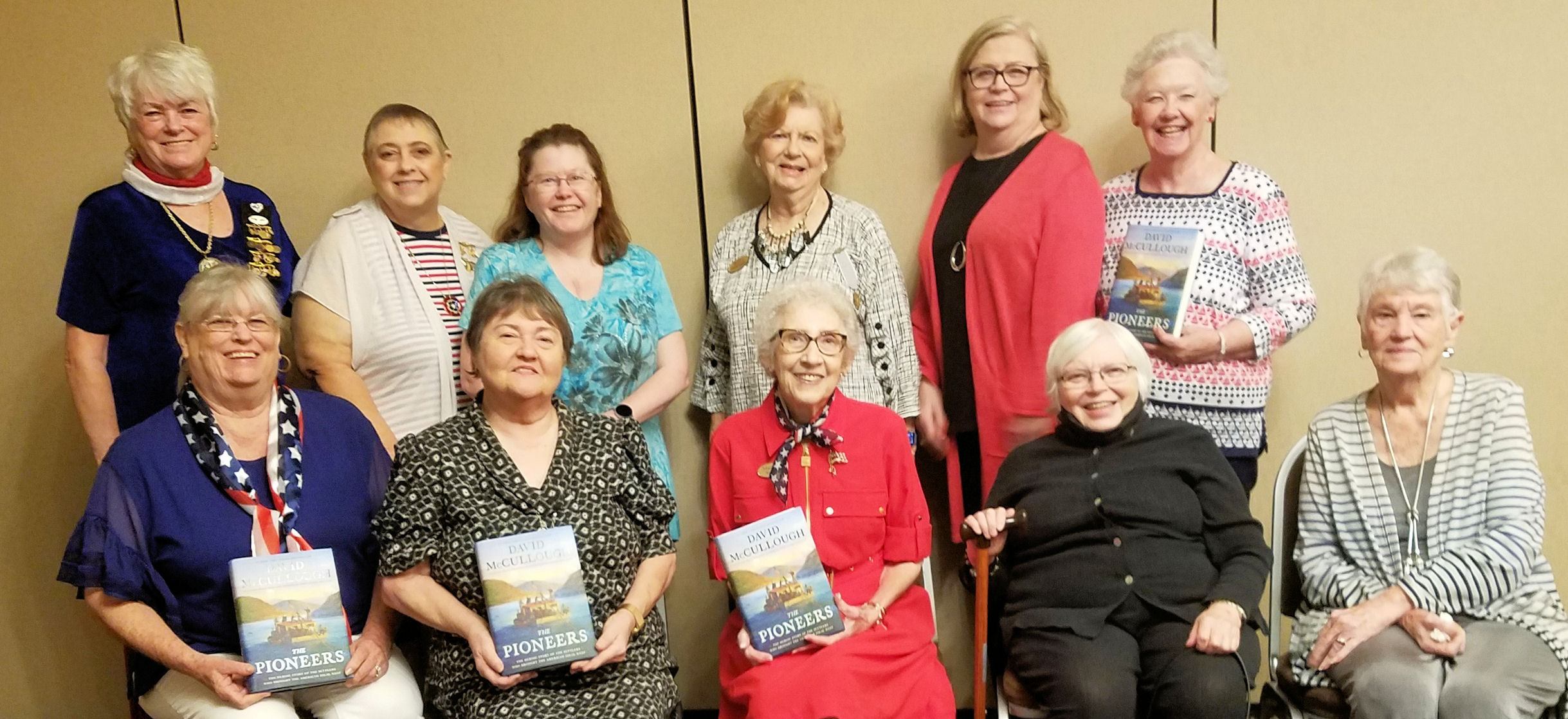 Organization donates history book to libraries