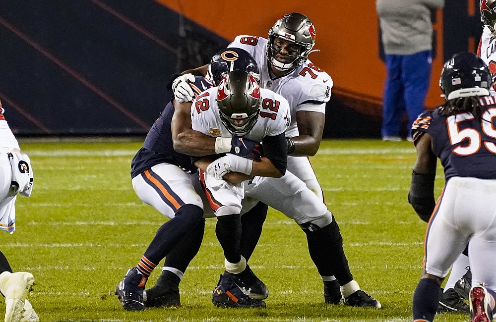 Chicago Bears quarterback Nick Foles (9) walks on the sidelines during the  second half of an