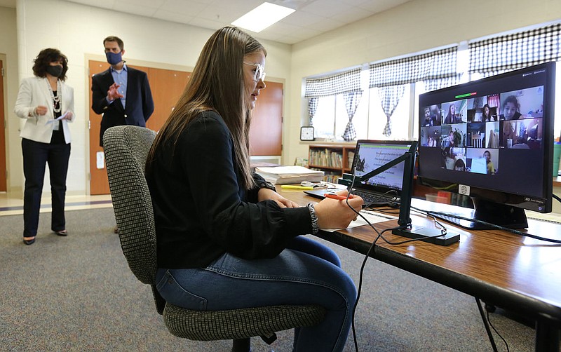 Gentry Primary School Principal Victoria Groomer and U.S. Sen. Tom Cotton observe a second-grade virtual class taught by Natalie Johnson in Gentry. Cotton toured the school to see how the Gentry School District is handling the pandemic and to observe protocols that have put in place.
(NWA Democrat-Gazette/David Gottschalk)