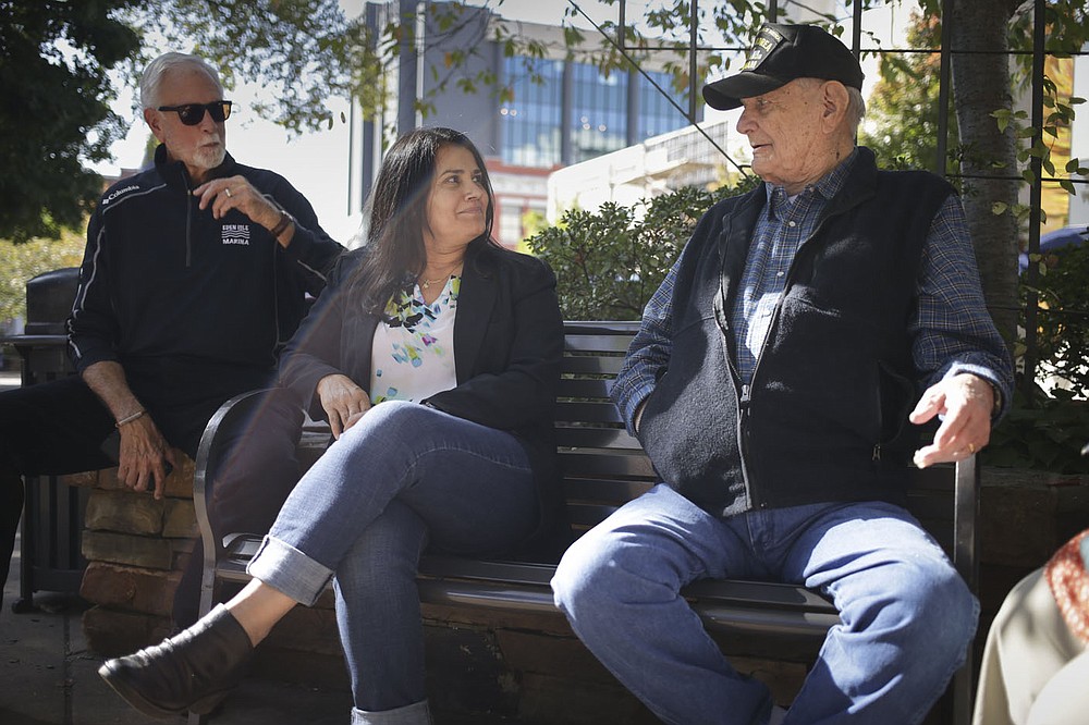 Danny Russell, Reyna Maloy and Albert King recall memories, Friday, October 2, 2020 at the Fayetteville Square in Fayetteville. Check out nwaonline.com/2010010Daily/ for today's photo gallery.
(NWA Democrat-Gazette/Charlie Kaijo)