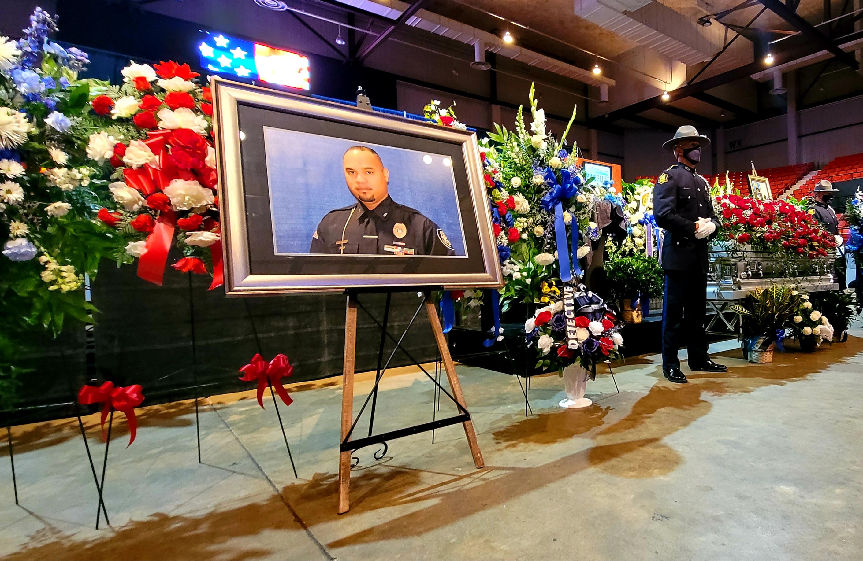 Mourners gather in memory of officer killed in line of duty
