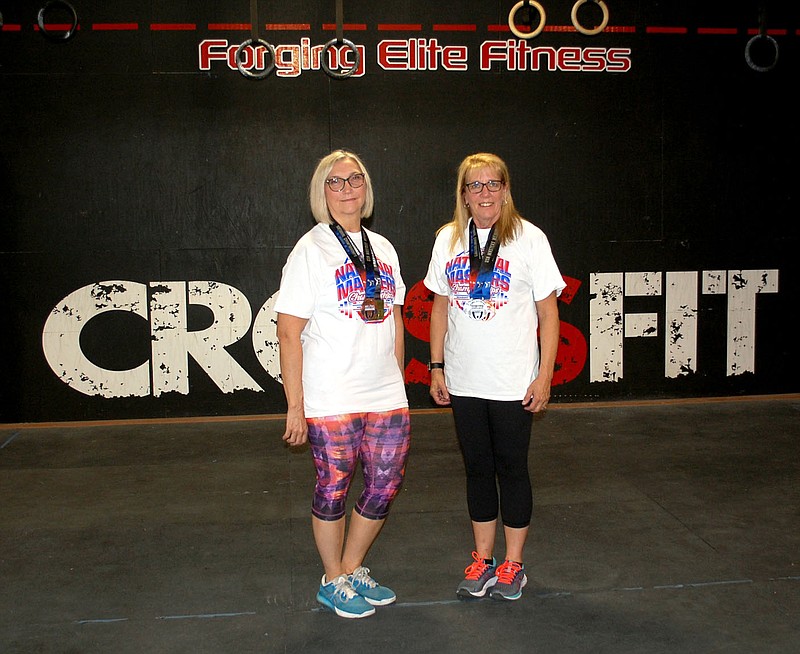 Janelle Jessen/Herald-Leader
Eleanor Mallow and Lynn Paskiewicz recently won national medals for Olympic weightlifting.