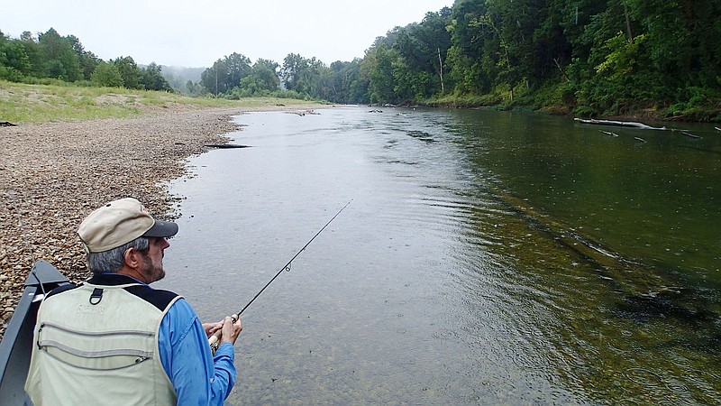 Russ Tonkinson enjoys the solitude, quiet and good fishing on the Elk River Sept. 11 2020, the Friday after Labor Day. The stream is busy and packed with canoes and kayaks during summer. Come September, it's a fisherman's river once again. 
(NWA Democrat-Gazette/Flip Putthoff)