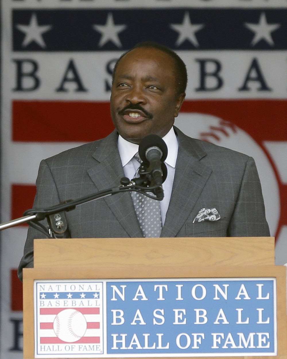 FILE - In this July 28, 2013, file photo, Baseball Hall of Famer Joe Morgan speaks during ceremonies in Cooperstown, N.Y. Joe Morgan has died. A family spokesman says he died at his home Sunday, Oct. 11, 2020, in Danville, Calif. (AP Photo/Mike Groll, File)