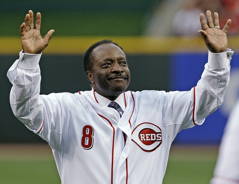 FILE - In this Wednesday, April 7, 2010, file photo, Cincinnati Reds Hall of Fame second baseman Joe Morgan acknowledges the crowd after throwing out a ceremonial first pitch prior to the Reds' baseball game against the St. Louis Cardinals, in Cincinnati. Hall of Fame second baseman Joe Morgan has died. A family spokesman says he died at his home Sunday, Oct. 11, 2020, in Danville, California. (AP Photo/Al Behrman)