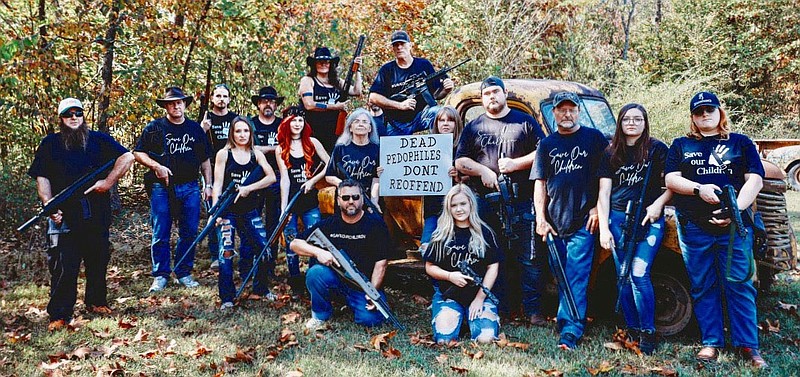 Submitted Photo
Members of 2A NWA STAND! and Save Our Children pose at the Save Our Children fundraiser Saturday, Oct. 10, south of Gravette. Over $1,000 was raised for Operation Underground Railroad at the event.