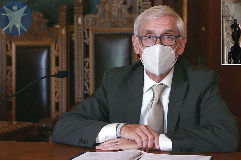 FILE - This July 30, 2020 image taken from video by the Wisconsin Department of Health Services shows Wisconsin Gov. Tony Evers in Madison, Wis. A Wisconsin judge on Monday, Oct. 12, 2020, upheld Gov. Tony Evers' mask mandate in the face of a conservative challenge. St. Croix County Circuit Judge R. Michael Waterman ruled that Evers did not overstep his authority by issuing multiple emergency orders on the coronavirus. (Wisconsin Department of Health Services via the AP, File)