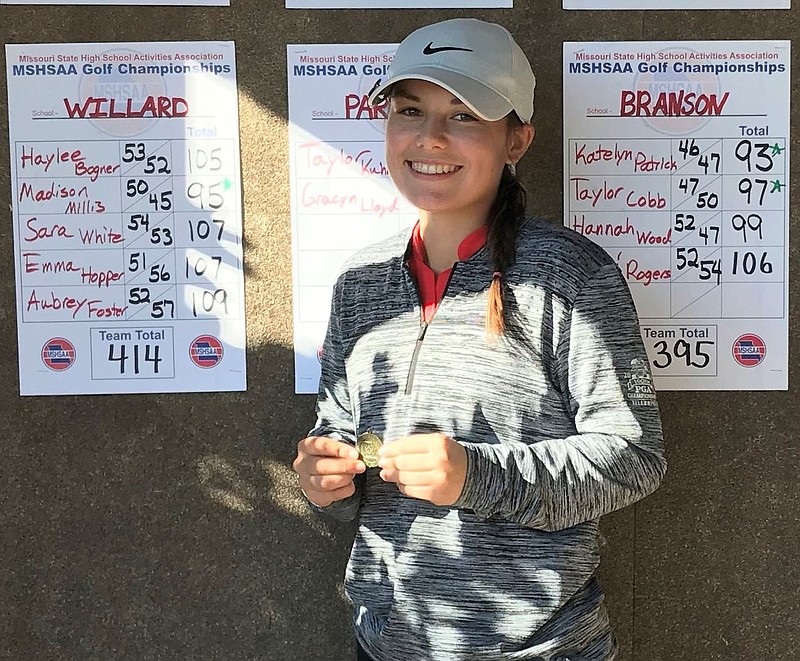 COURTESY PHOTO McDonald County's Lily Allman holds the individual championship medal after winning the individual title at the Missouri Class 3 District 3 Girls' Golf Championships on Oct. 12 at Horton Smith Golf Course in Springfield. The district title was the second consecutive district championship for the McDonald County senior.