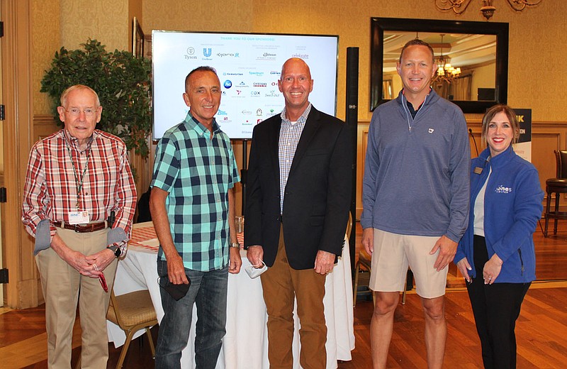 Ed Clifford, Jones Center CEO (from left); John George, center board member; Michael Samson, Jason Nichol, The Golf Event co-chab. irmen; and Kelly Kemp, director of advancement welcome golfers for the 14th annual benefit tournament Oct. 5 at Springdale Country Club.
(NWA Democrat-Gazette/Carin Schoppmeyer)