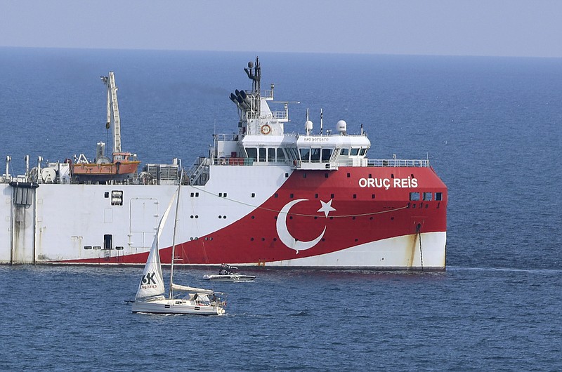 FILE - In this Sunday, Sept. 13, 2020 file photo, Turkey's research vessel, Oruc Reis anchored off the coast of Antalya on the Mediterranean, Turkey. Greece accused neighbor Turkey of undermining efforts to ease a crisis over drilling rights in the eastern Mediterranean on Monday Oct. 12, 2020, after Turkey announced its survey vessel, the Oruc Reis, would be dispatched for a new research mission in disputed waters. (AP Photo/Burhan Ozbilici, File)