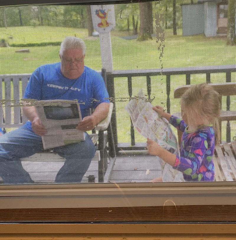 Randy Norman and his 5-year-old granddaughter Harper Smith. - Submitted photo story.lead_photo.caption