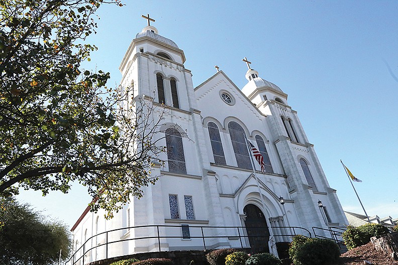 The exterior of the Catholic Church of St. John the Baptist in Hot Springs. - Photo by Richard Rasmsusen of The Sentinel-Record story.lead_photo.caption