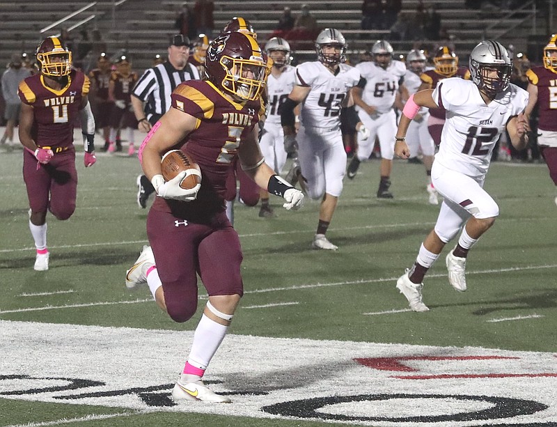 Lake Hamilton’s Owen Miller (2) runs for the first touchdown of the game against Siloam Springs during first half action at Lake Hamilton Friday. Photo by Richard Rasmussen of The Sentinel-Record story.lead_photo.caption