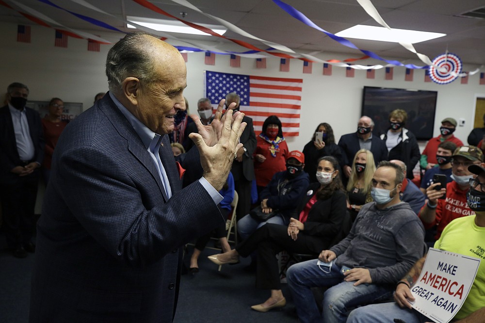 Former New York Mayor Rudy Giuliani speaks Monday, Oct. 12, 2020 during a Columbus Day gathering at a President Donald Trump campaign field office in Philadelphia. (AP Photo/Jacqueline Larma)