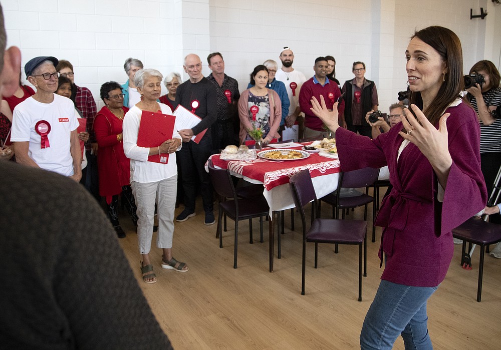 New Zealand Prime Minister Jacinda Ardern gestures as she thanks her electorate workers at an event in Auckland, New Zealand, Saturday, Oct. 17, 2020. New Zealand is holding a general election Saturday, and opinion polls indicate Ardern is on track to win a second term as prime minister. (AP Photo/Mark Baker)