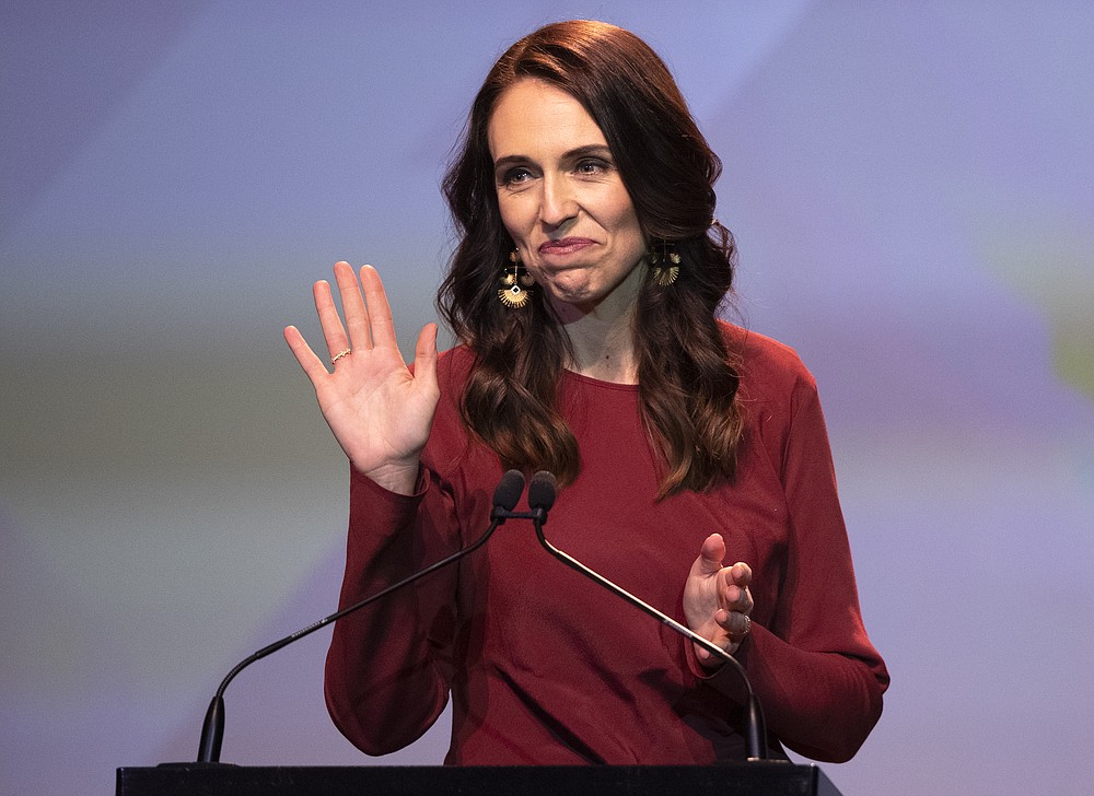 New Zealand Prime Minister Jacinda Ardern waves as she prepares to give her victory speech to Labour Party members at an event in Auckland, New Zealand, Saturday, Oct. 17, 2020. (AP Photo/Mark Baker)