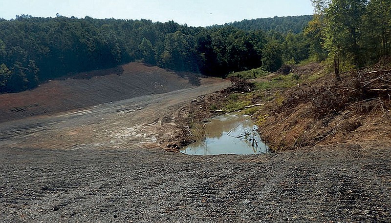 The dirt pit's rading west of the receiving stream, south of the dam. The receiving stream is on the right in Washington County.
(Courtesy Photo/Arkansas Department of Environmental Quality, Garrett Grimes)