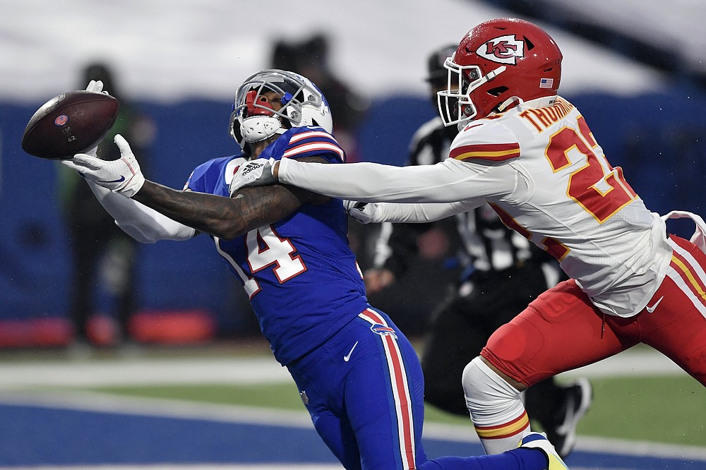 Chiefs kept on the ground, but run past Bills anyway